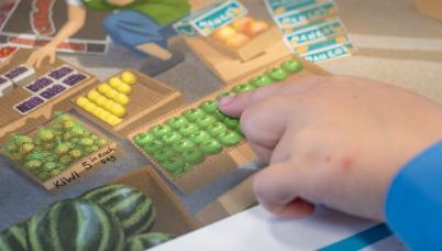 Student pointing at the reSolve Market